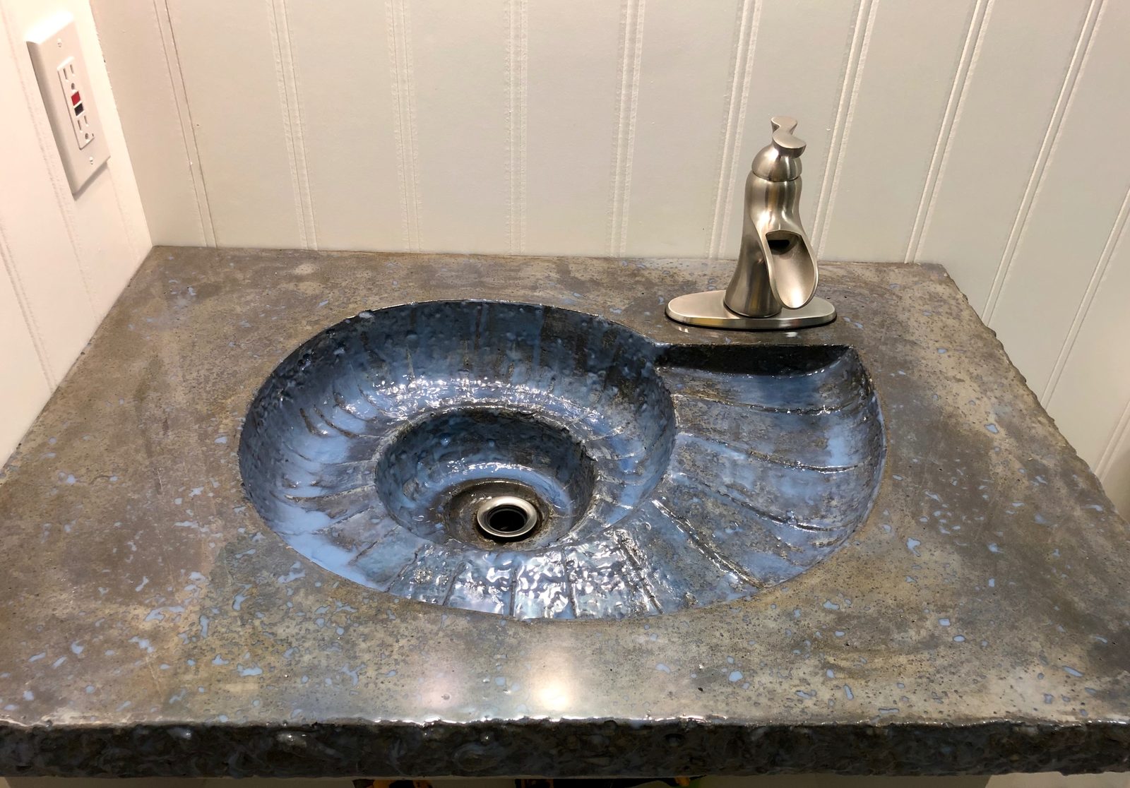 One-of-a-kind seashell sink, handmade by the owner